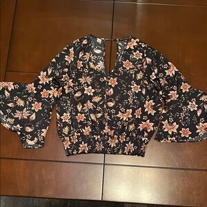 Kaii Black Floral V-Neck Peplum Blouse with Bell Sleeves